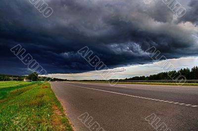 Black clouds over the road