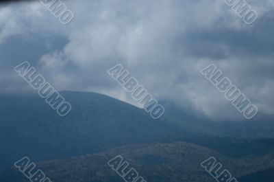 Clouds and mountains. Clouds and mountains.
