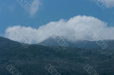 Clouds and mountains.