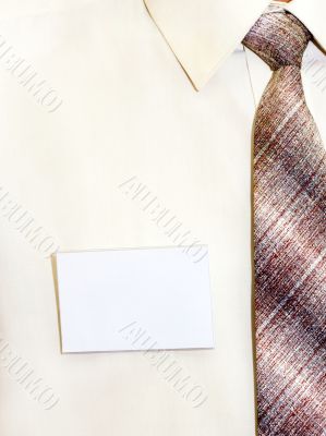 blank badge pinned to his shirt blank badge pinned to his shirt