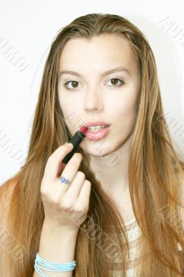 applying lipstick