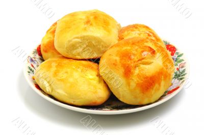 baked buns on a plate