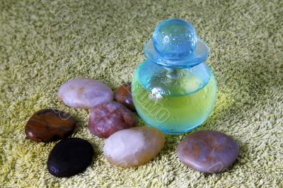 Blue bottle with massage oil