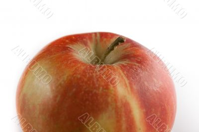 Red apple on white background. Detail.