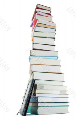 Tall stack of books and e-book reader