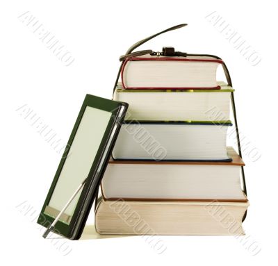 Stack of books and electronic book reader