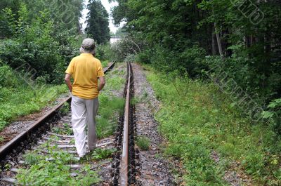 Walking Away Down Railroad Track