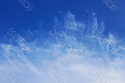 Easy crests of white clouds