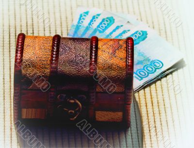 against the background of a beautiful box of money