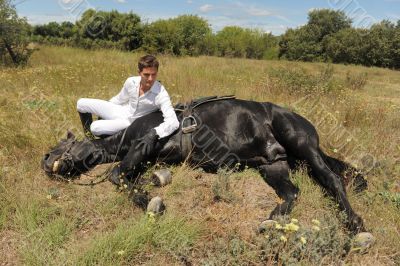 young man and horse young man and horse