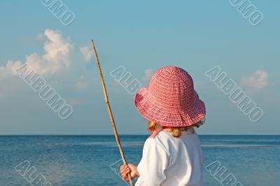 A little girl on the seashore