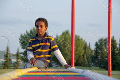 Sitting on the monkey bar