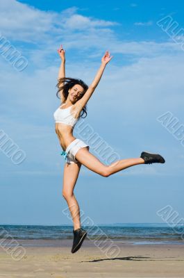 jumping on the beach