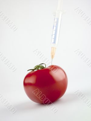 tomato with syringe