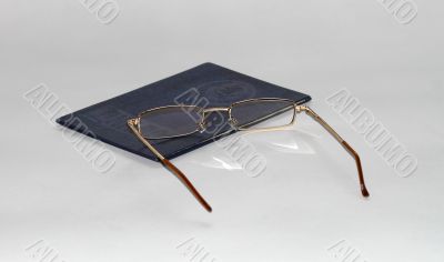 diploma of education and glasses