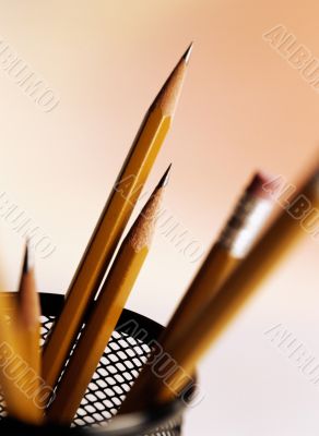 Image of Pencils in holder. Image of Pencils in holder.