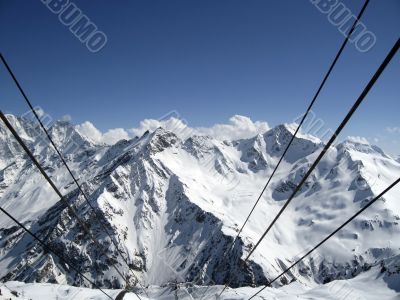Mountain under the blue sky and the clouds