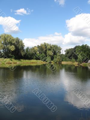 summer rural landscape with forest and river