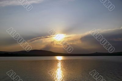 Sunset. Tambukan lake. Summer