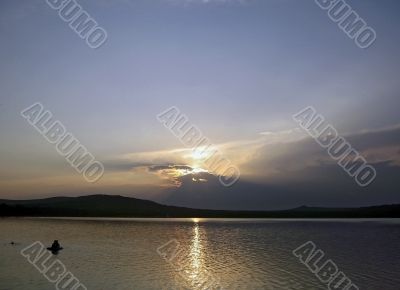 Sunset. Tambukan lake. Summer