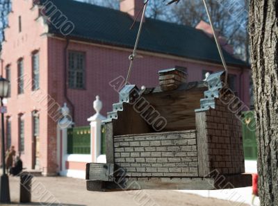 gray wooden bird feeder Moscow