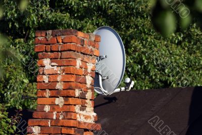 Brick chimney and satellite communication tv