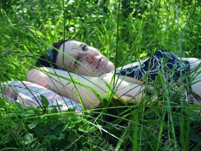 Woman laying on the grass