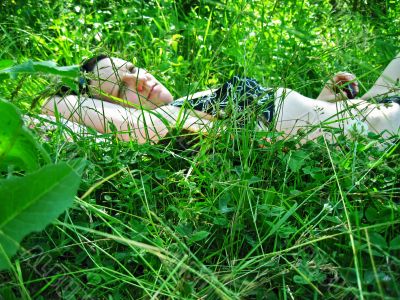 Woman laying on the grass