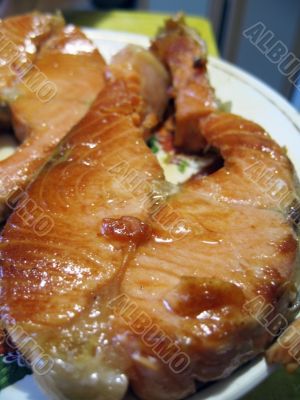 Red fish steak on the plate