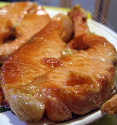 Red fish steak on the plate