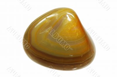 Yellow round stone with curves