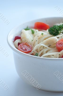 Angel hair pasta with tomato and parsley