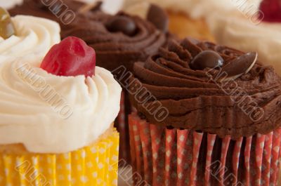 Cupcakes with cherry and chocolate