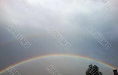 Rainbow rising after rain