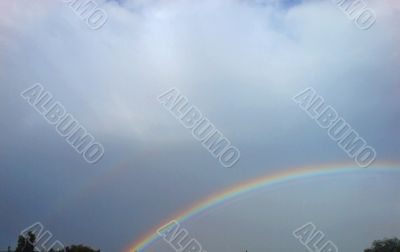 Rainbow rising after rain