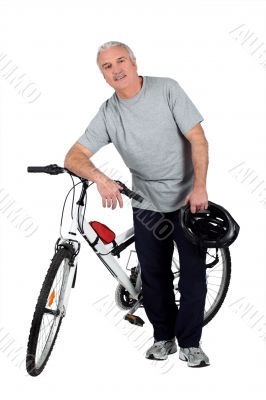 a mature man and a mountain bike