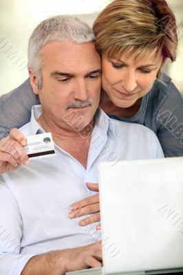 Couple making purchases on the Internet