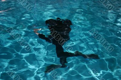 Diver moving underwater