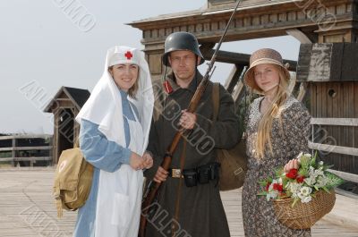 Retro styled picture with two womens and soldier