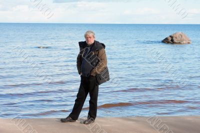 Middle-aged man at the sea.