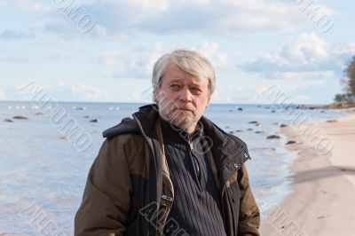 Middle-aged man at the sea.