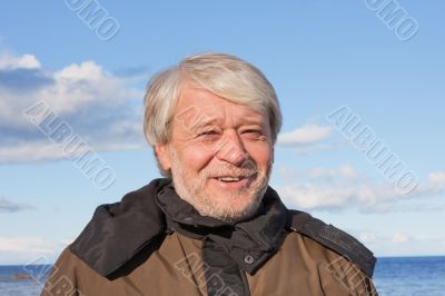 Portrait of middle-aged man at the sea.