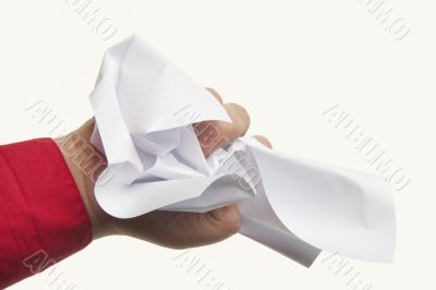Crumpled paper in hand