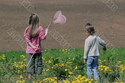 Brother and sister in summer day.