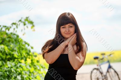 Beauty woman with bicycle