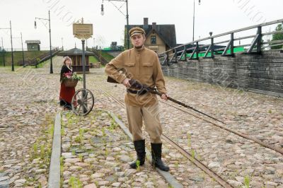 Lady and soldier with  gun in retro style picture