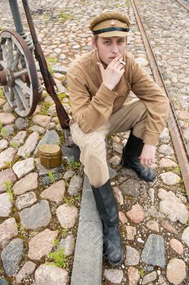 Retro style picture with smoking soldier.