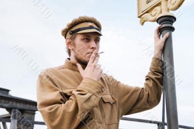 Retro style picture with smoking soldier.