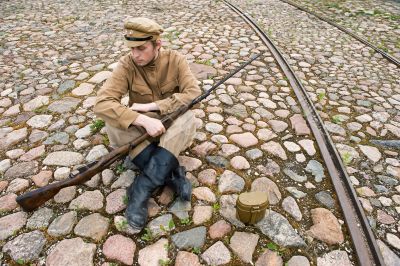 Soldier with boiler and gun in retro style picture