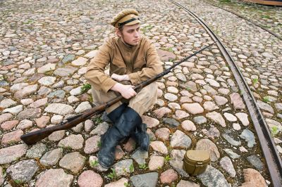 Soldier with boiler and gun in retro style picture